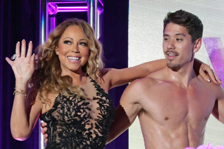 Mariah Carey cozies up to her backup dancer | mcarchives.com