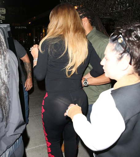 Mariah Carey flashes skimpy thong at dinner with twins | mcarchives.com