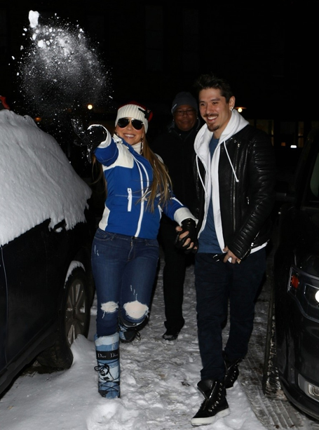 Mariah Carey tosses snowballs at photographers in Aspen | mcarchives.com