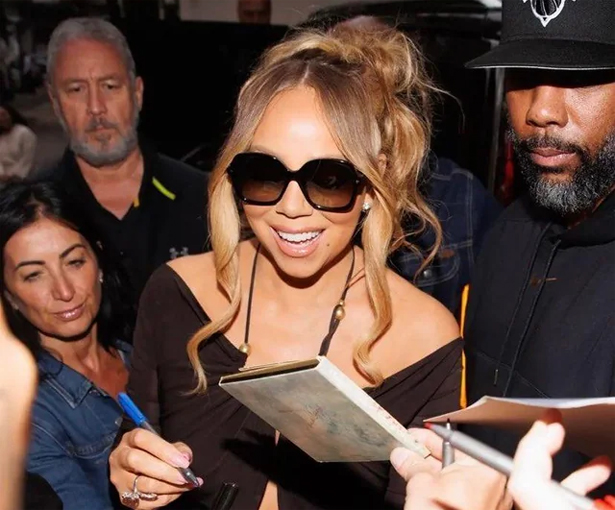 Mariah Carey arrives in Brazil in the perfect dress | mcarchives.com